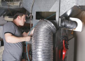 technician-performing-duct-cleaning